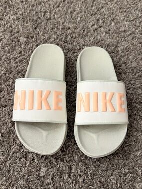Nike White Slides with Peach Logo